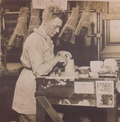 Henry Wren demonstrating pottery making at the annual Artist Craftsman Exhibition, 1930s